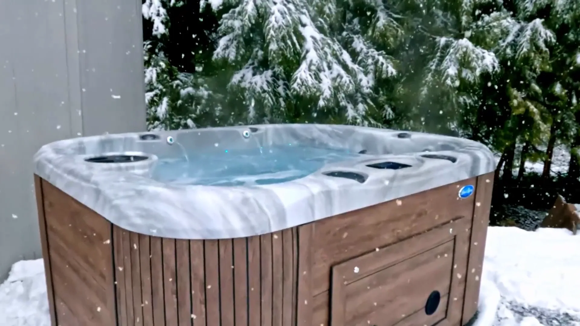 A hot tub running in a Muskoka snowfall